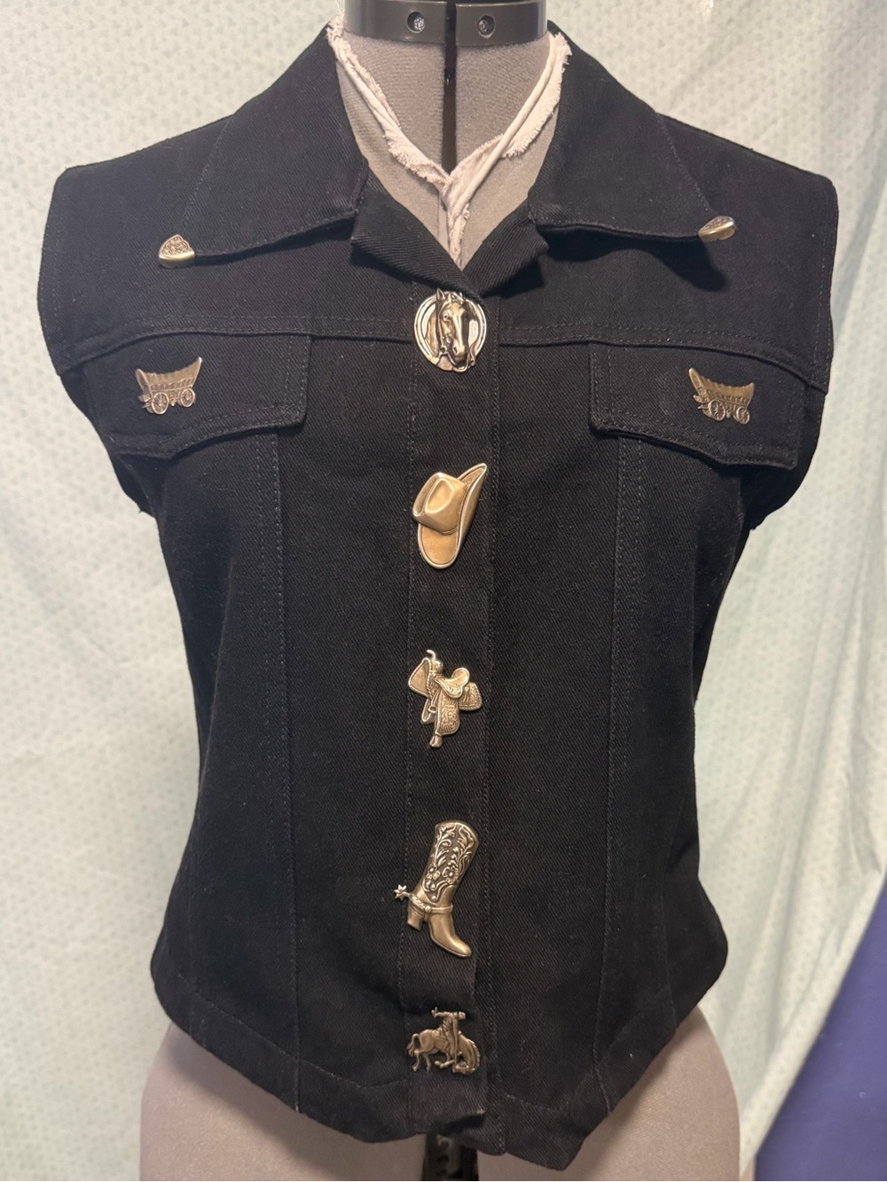 The Brass Menagerie vintage black denim vest in pristine condition.
